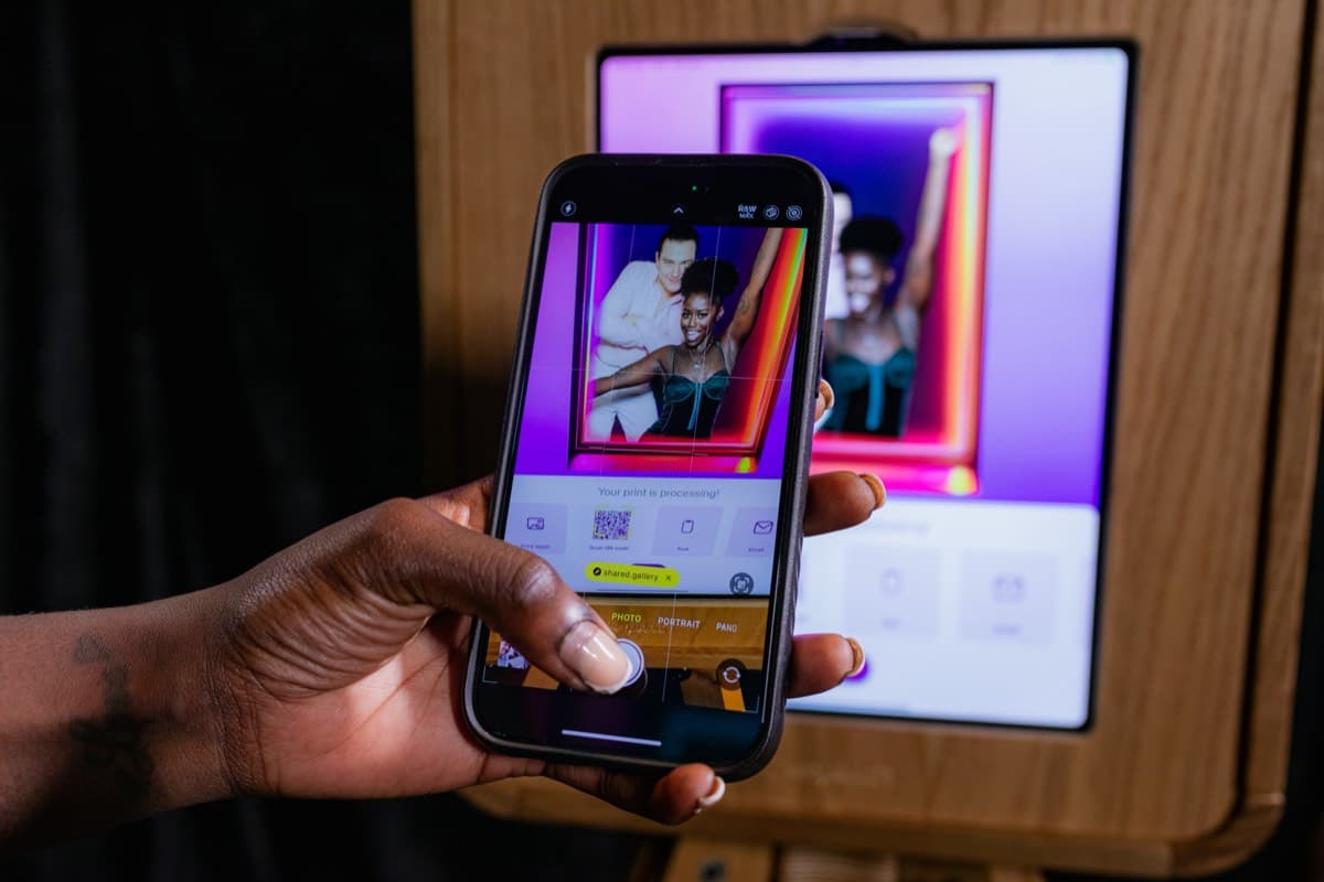 A photo showing a person using a photo booth app